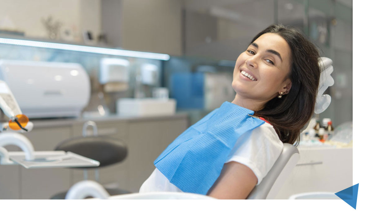 Patient Seated on Dental Chair for Root Canal Treatment in Athens, AL